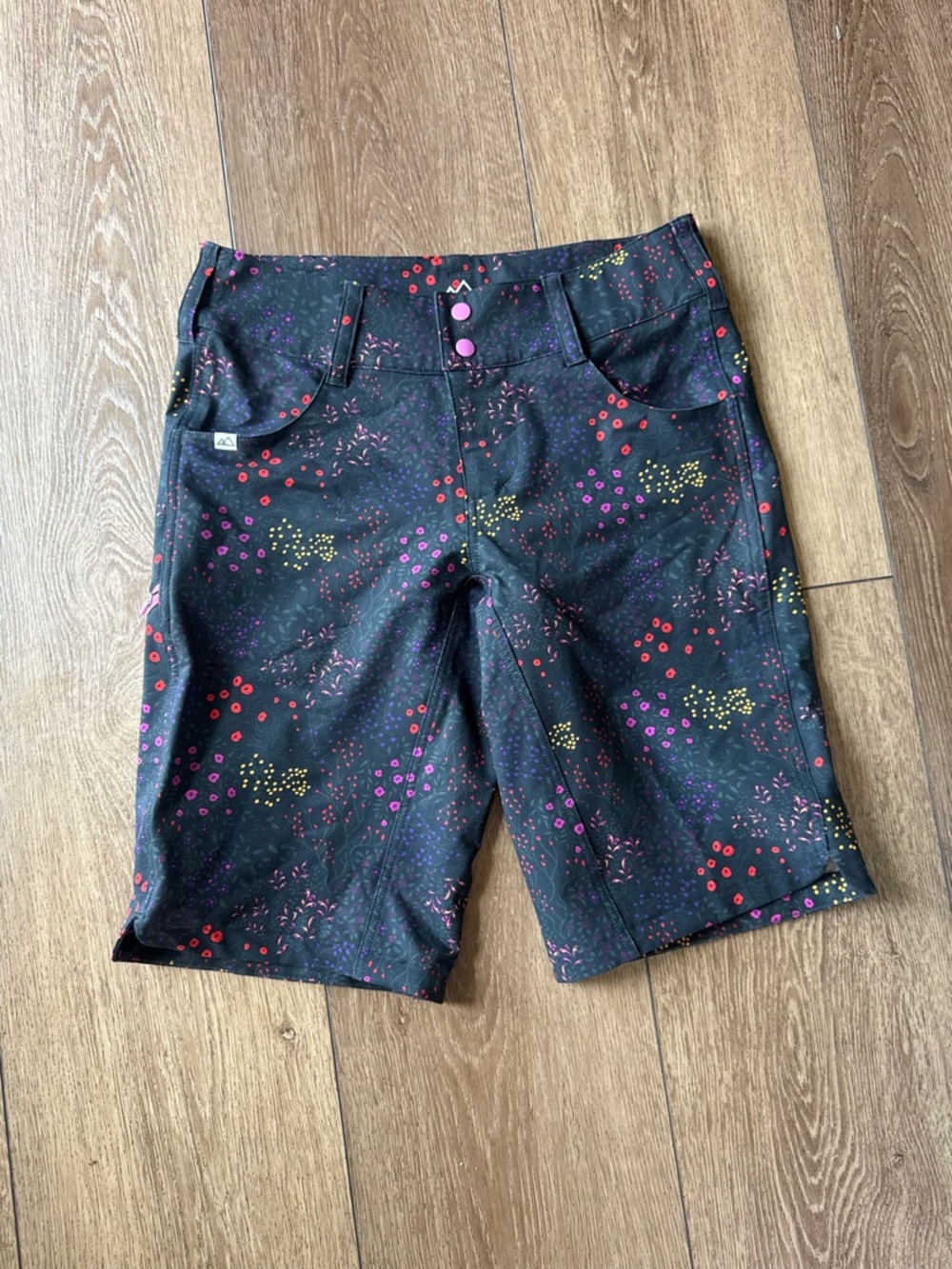 Wild Rye Kaweah Black Floral Print Shorts with Pink Accent Buttons